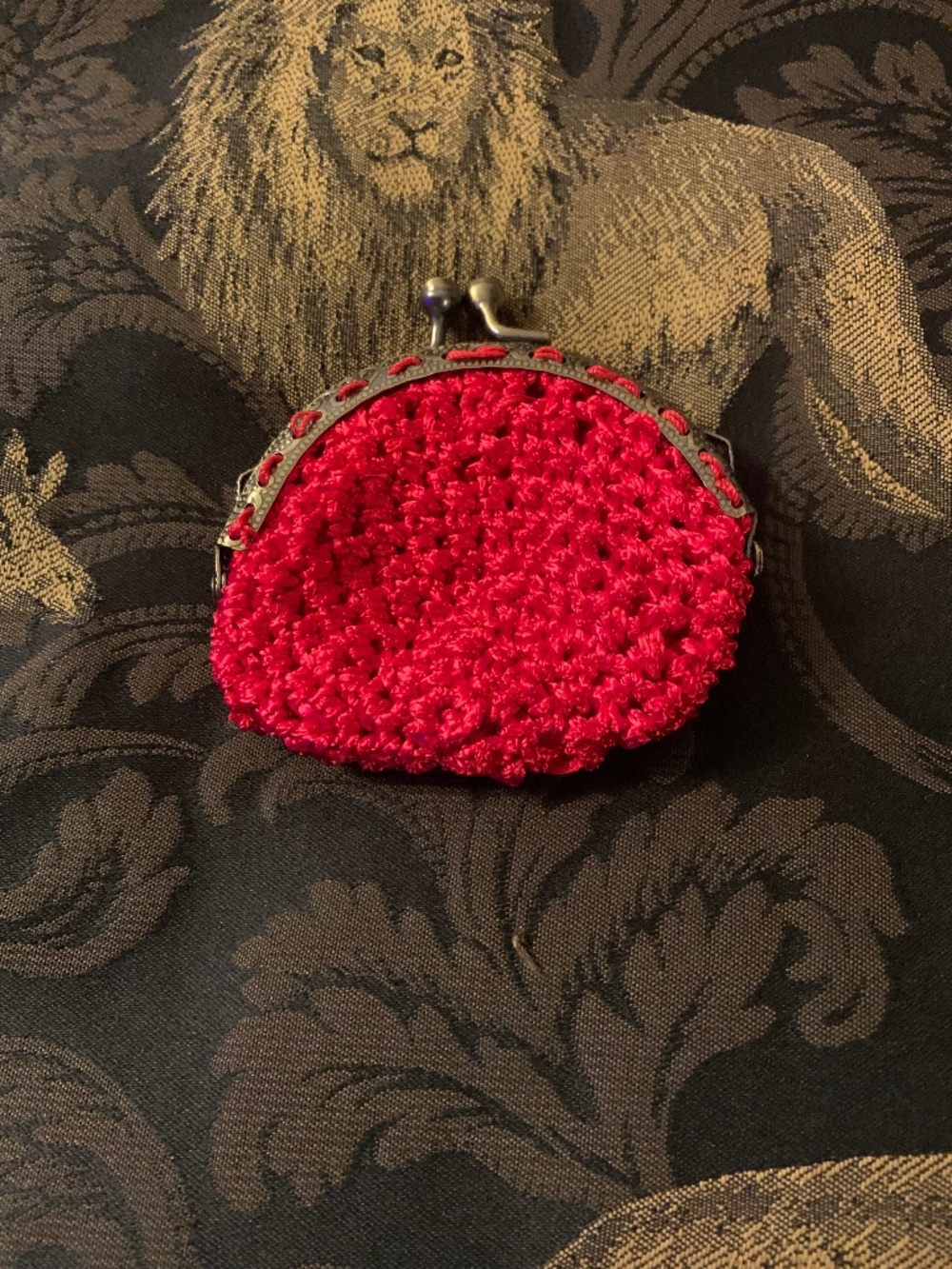 Red metallic crocheted handmade coin purse. Fits in any larger purse. New